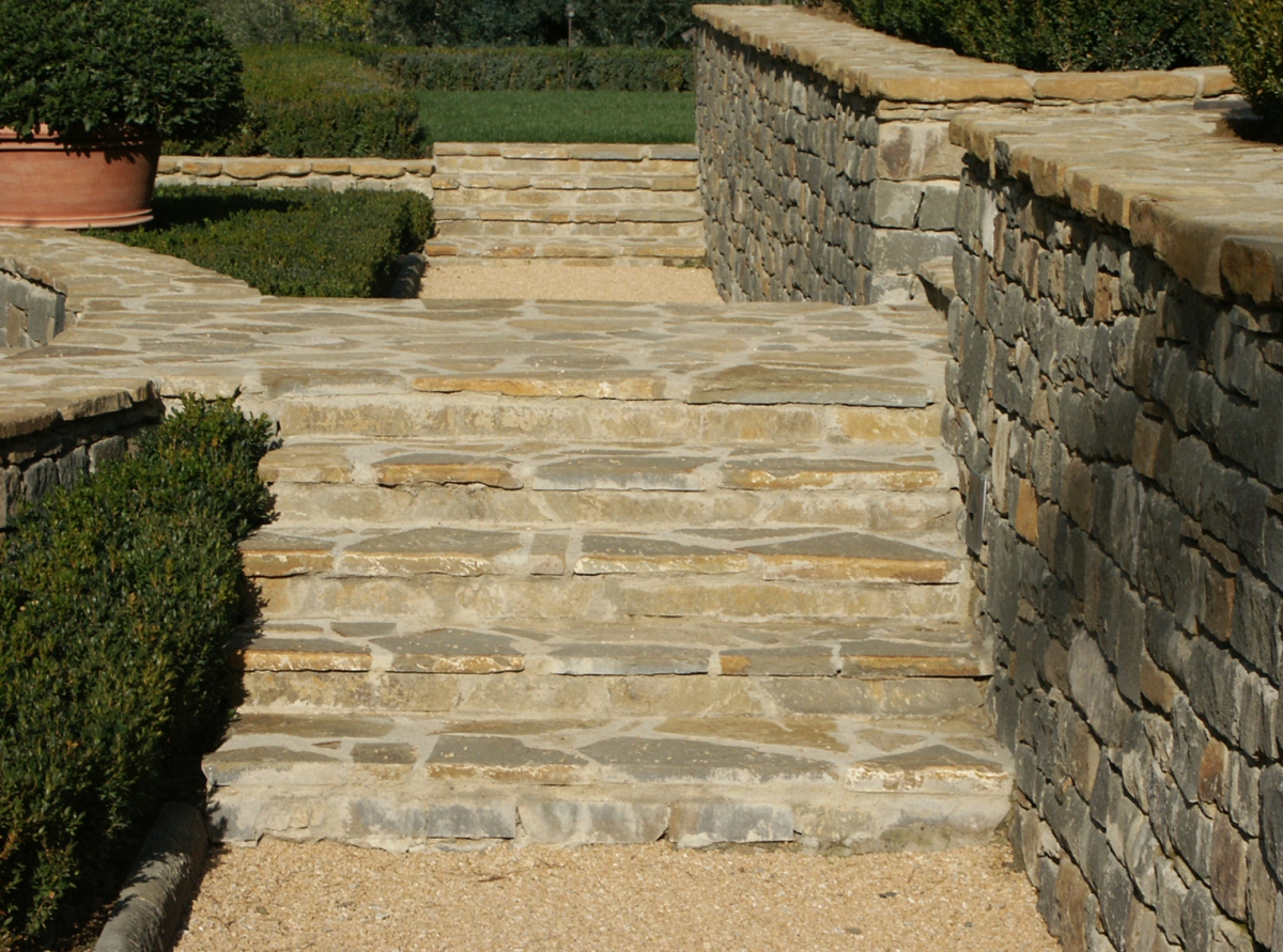 Stair rustica of Pietraforte opera incerta with natural surface