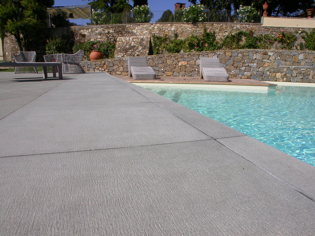 Pool Copings and  flooring of Pietra Macigno finishing hammered