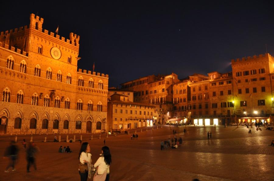 Il Campo, Siena's medieval piazza, is alive at all hours.
