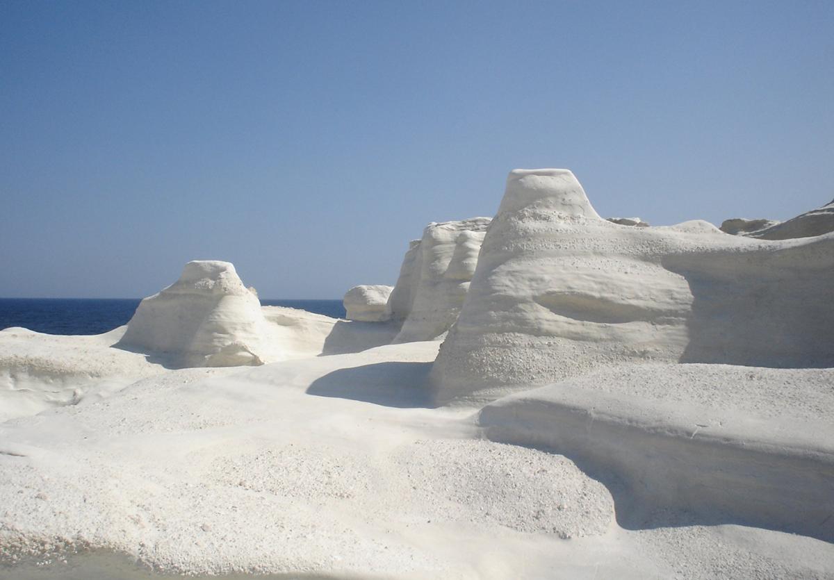 ...or Sarakiniko, hidden within 
a bone-white landscape of reefs.