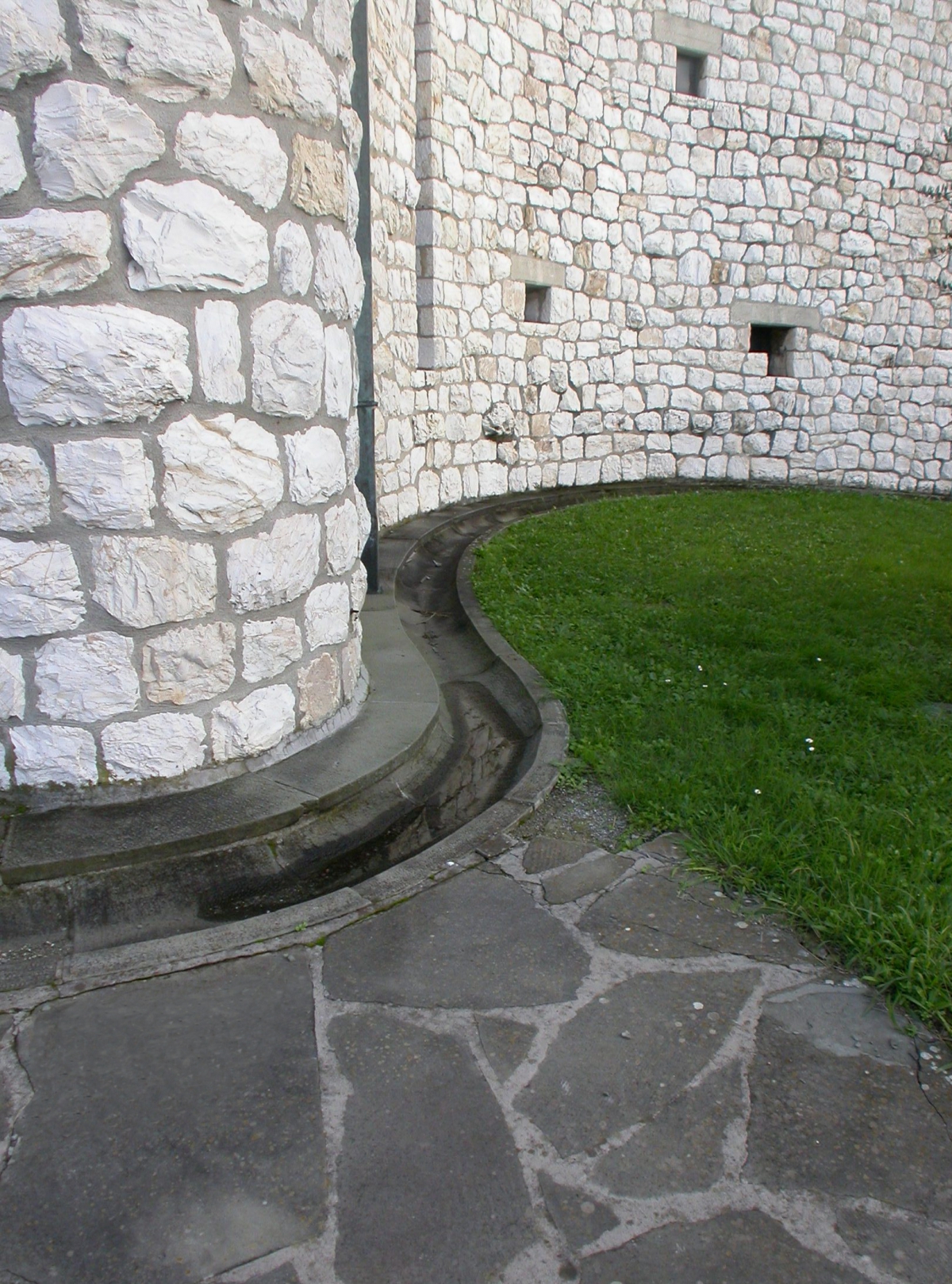 Concave zanella in curva of Pietra Macigno of Greve Chiesa di San Giovanni Battista Autostrada