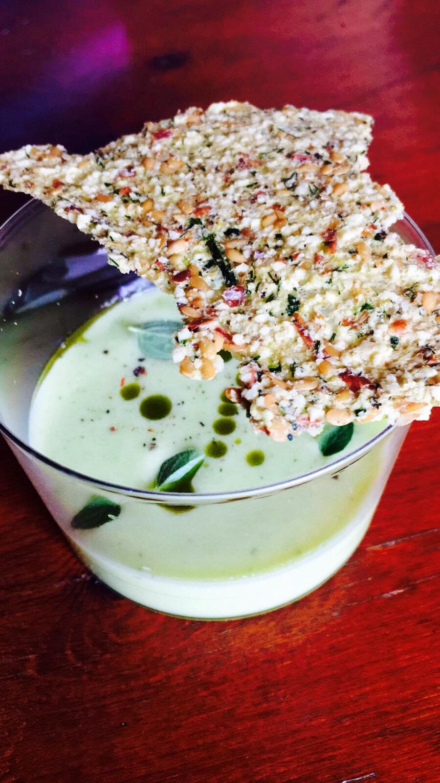  Lemon cream soup with fennel and dill. Seeds and vegetable crackers.