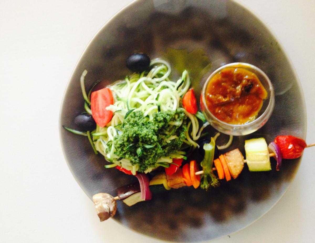 Raw zucchini spaghetti with walnut-basil pesto. Vegetable bruschetta with miso- orange dressing.