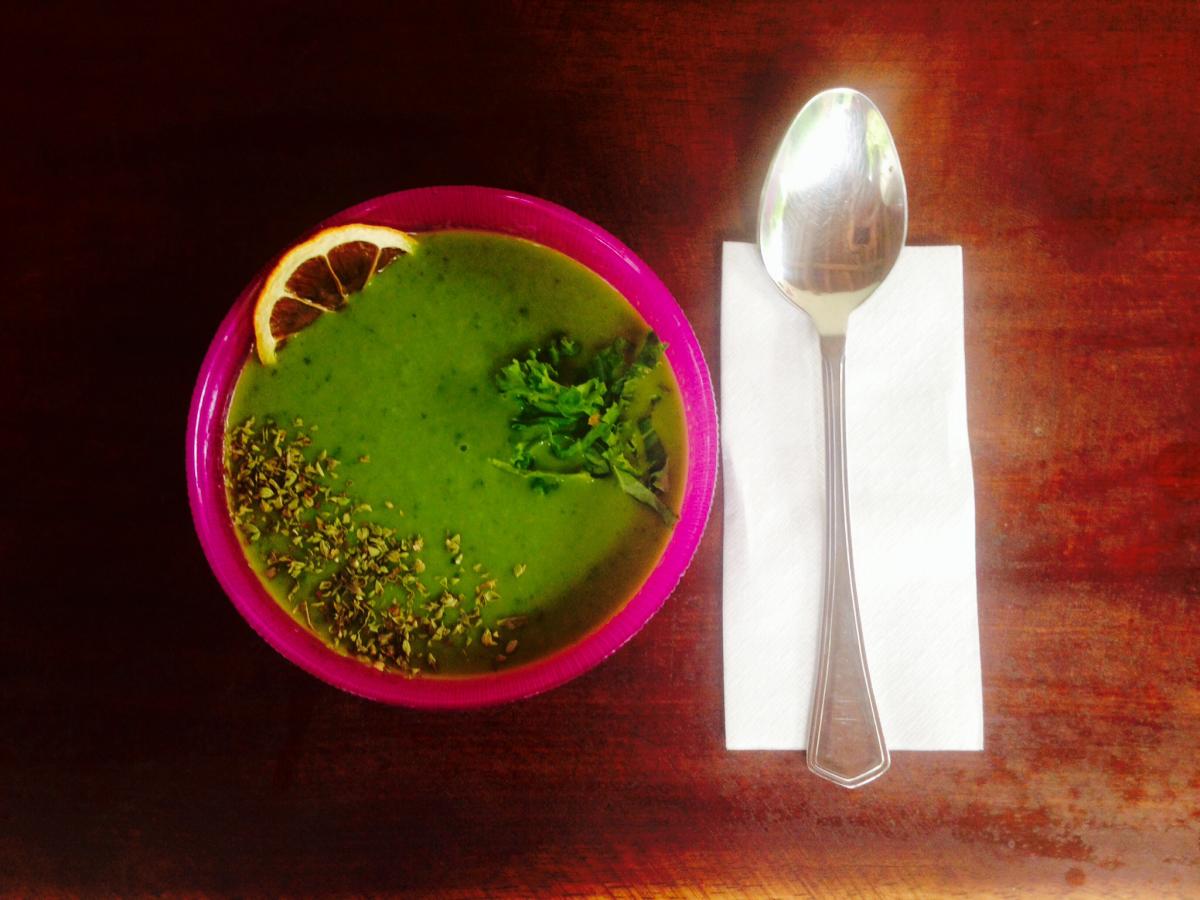 Spinach and kale soup with lemon.