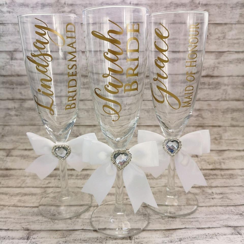 Personalised Champagne Flutes €5 or €5.50 with plain bow or €6 with bow & embellishment
